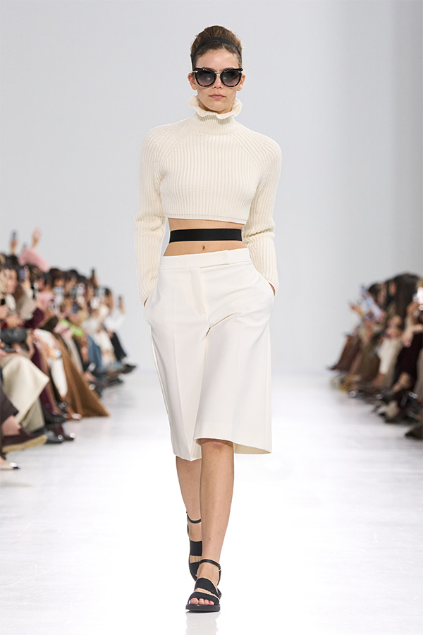 Max Mara Spring/Summer 2026 Fashion Show - White Look with Cropped Turtleneck and matching Bermuda shorts.